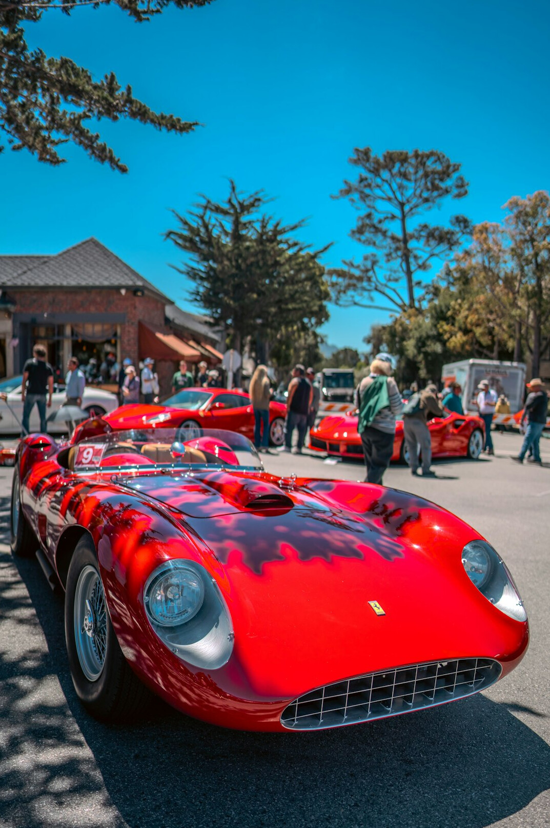 Vintage automobile displayed at an indoor auction event