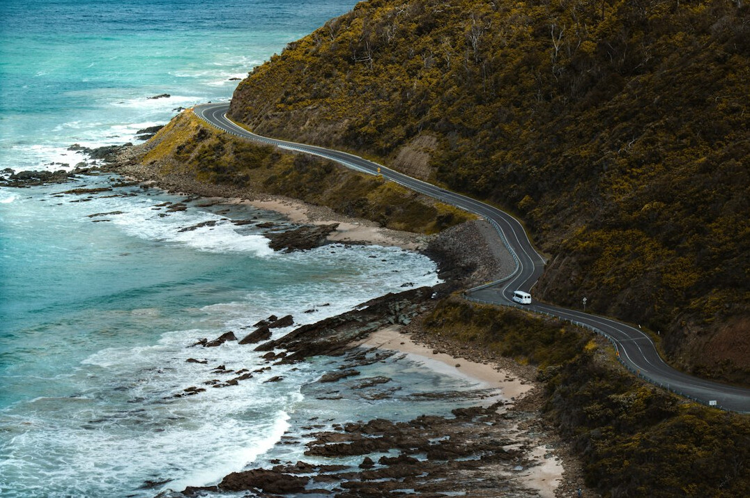 luxury suv on coastal highway
