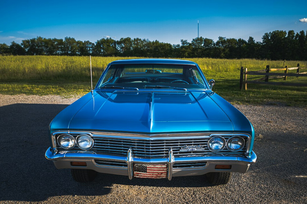 Front view of a restored 1960s classic automobile