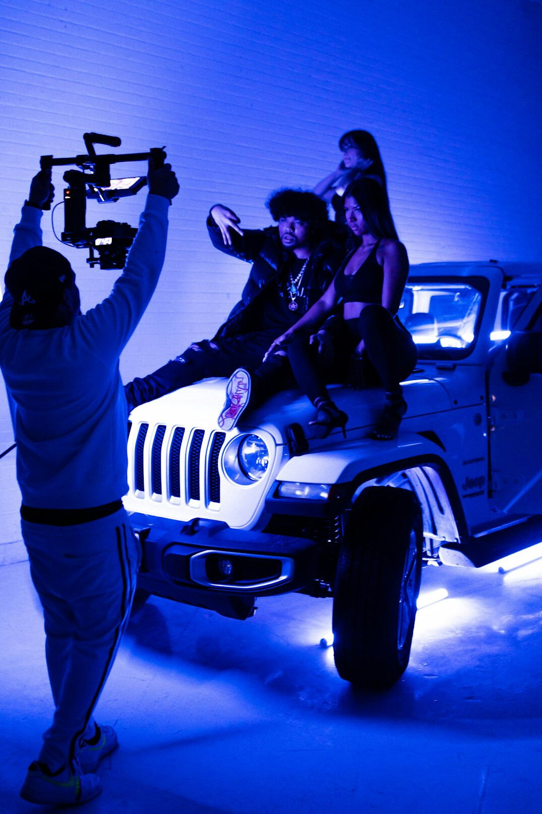 Group portrait of a diverse team of automotive editors and photographers